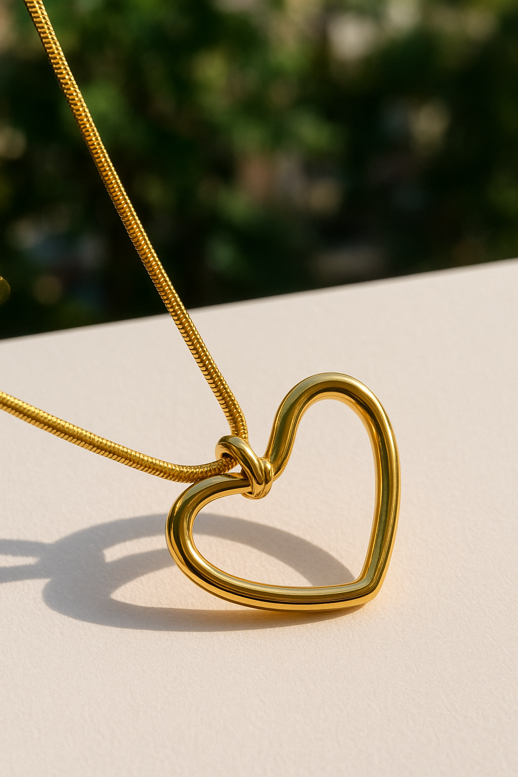 Stainless Steel Open Heart Pendant Necklace – Gold Tone