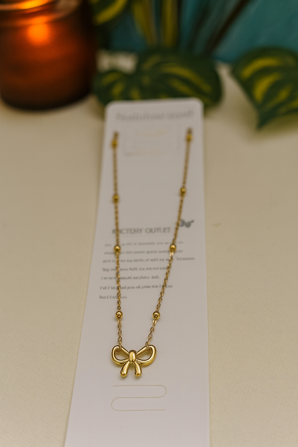 “Tarnish Free Golden Bow Pendant Necklace – Elegant & Timeless Design”