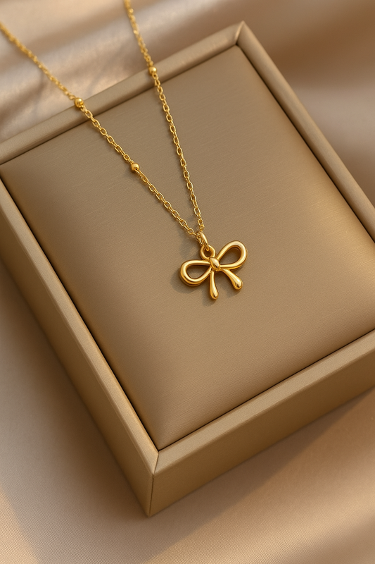 “Tarnish Free Golden Bow Pendant Necklace – Elegant & Timeless Design”
